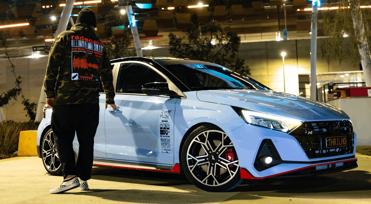 Modified Hyundai i20N at night in a Perth car park, fitted with Radecals Motorsport parts