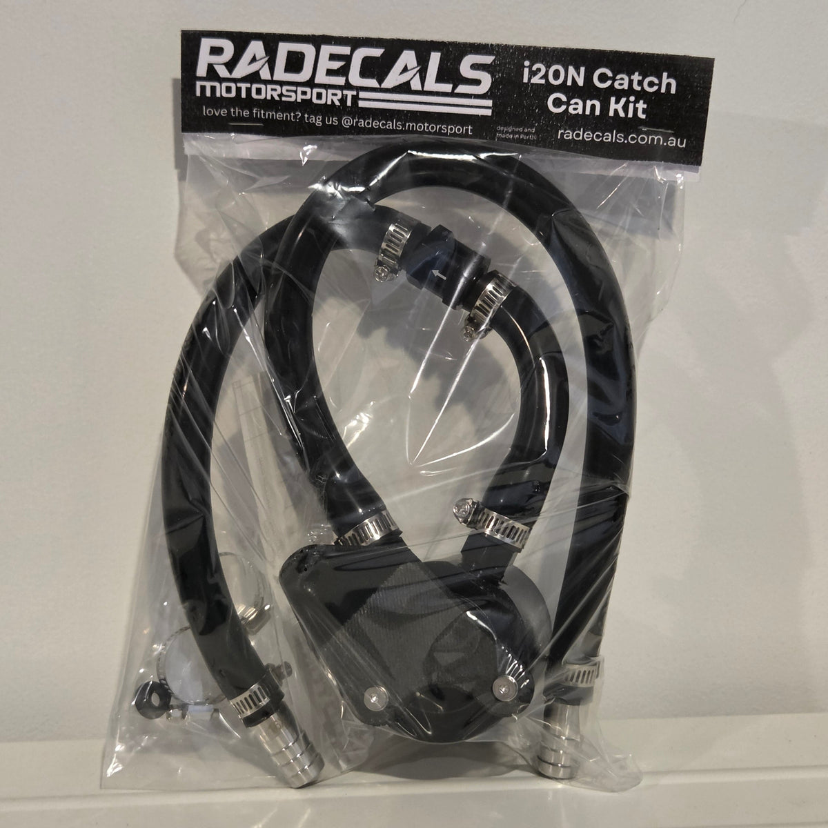 Radecals i20N Catch Can Kit in its retail packaging, showing the catch can, hoses and fittings
