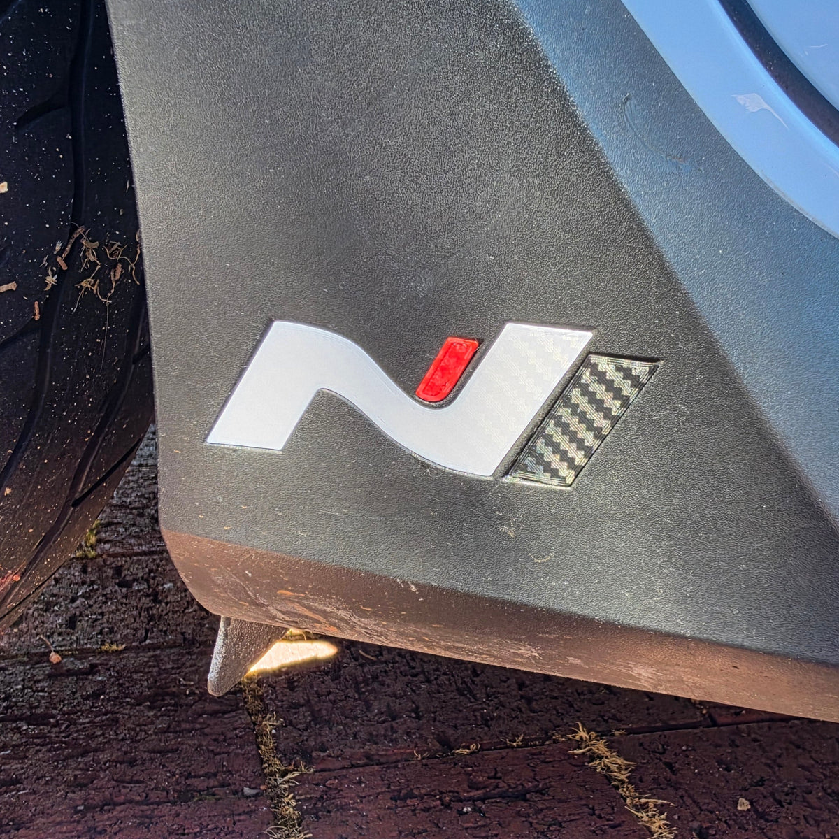 Hyundai i20N side skirt N logo badge fitted in the factory recess